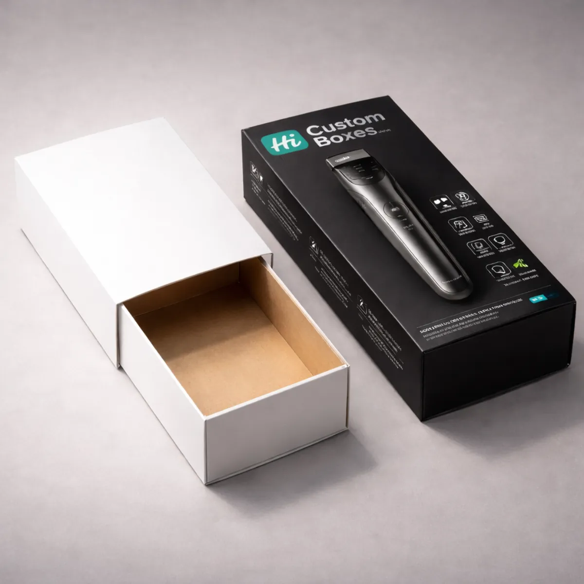 Premium sliding drawer style packaging in black and white for luxury grooming and trimmer sets. class=